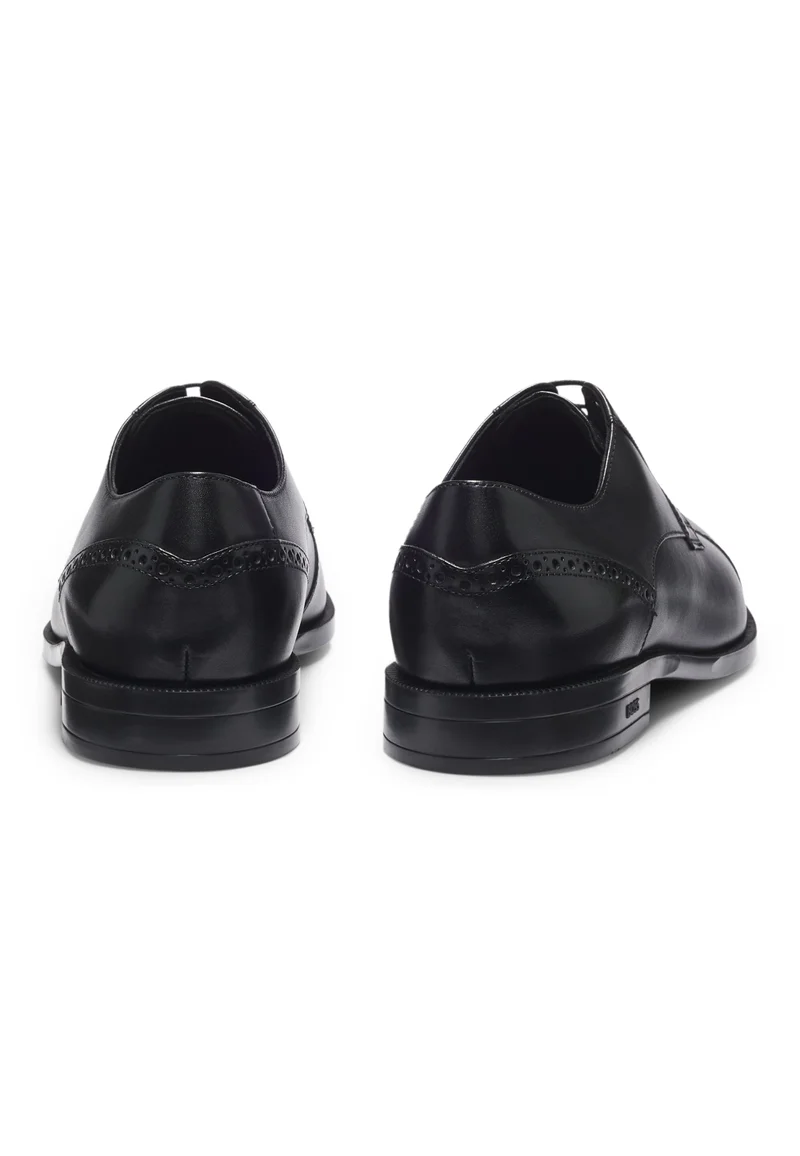 بوس أحذية ديربي جلدية بتفاصيل بروغ