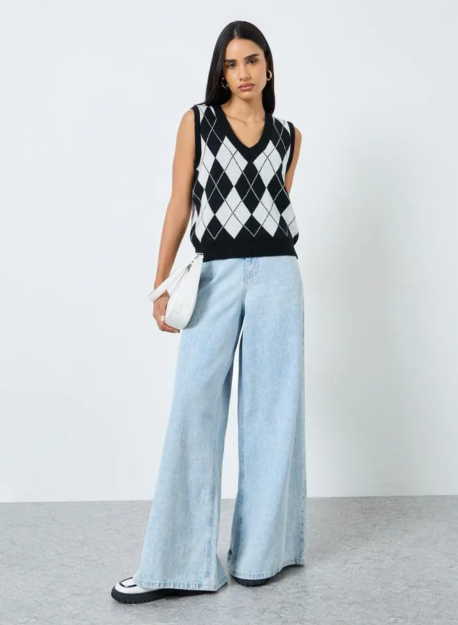 ستايلي بلوزة بطبعة مربعات بدون أكمام