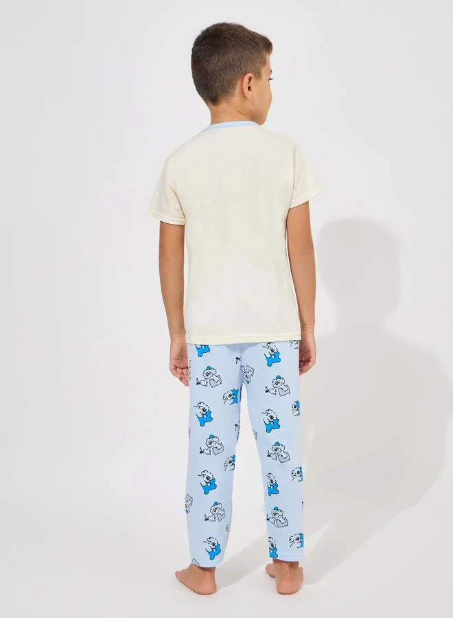 ستايلي Cartoon Graphic Print T-Shirt & Pyjama Set