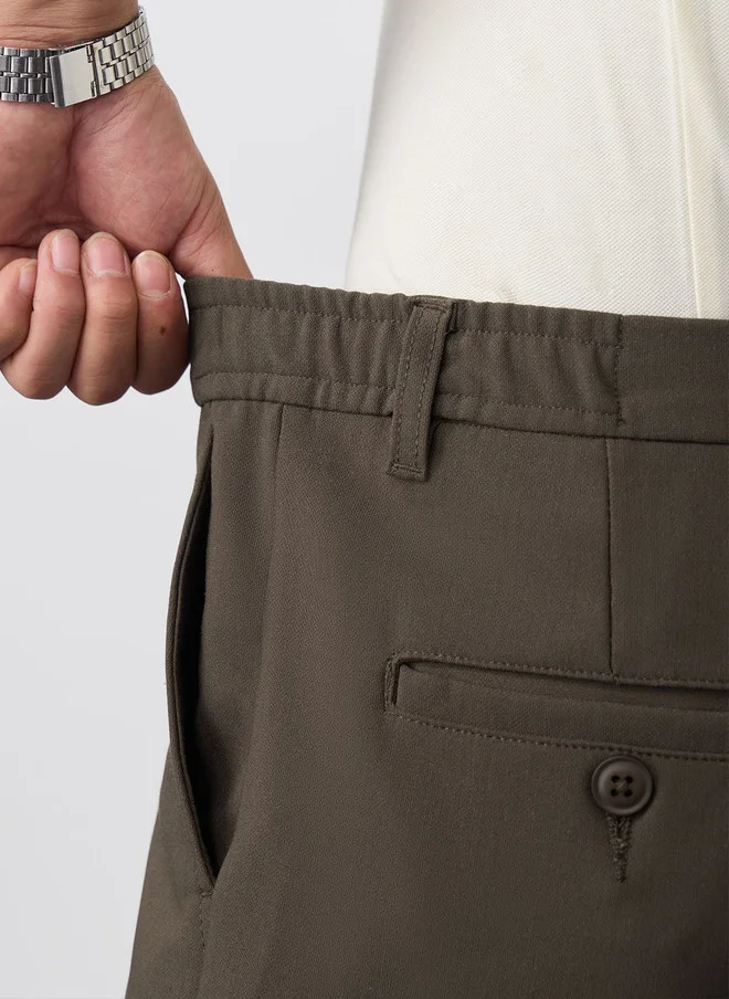 The Souled Store  The Souled Store Men Slim Fit Solid Taupe Super Flex Pants  | Best Price UAE