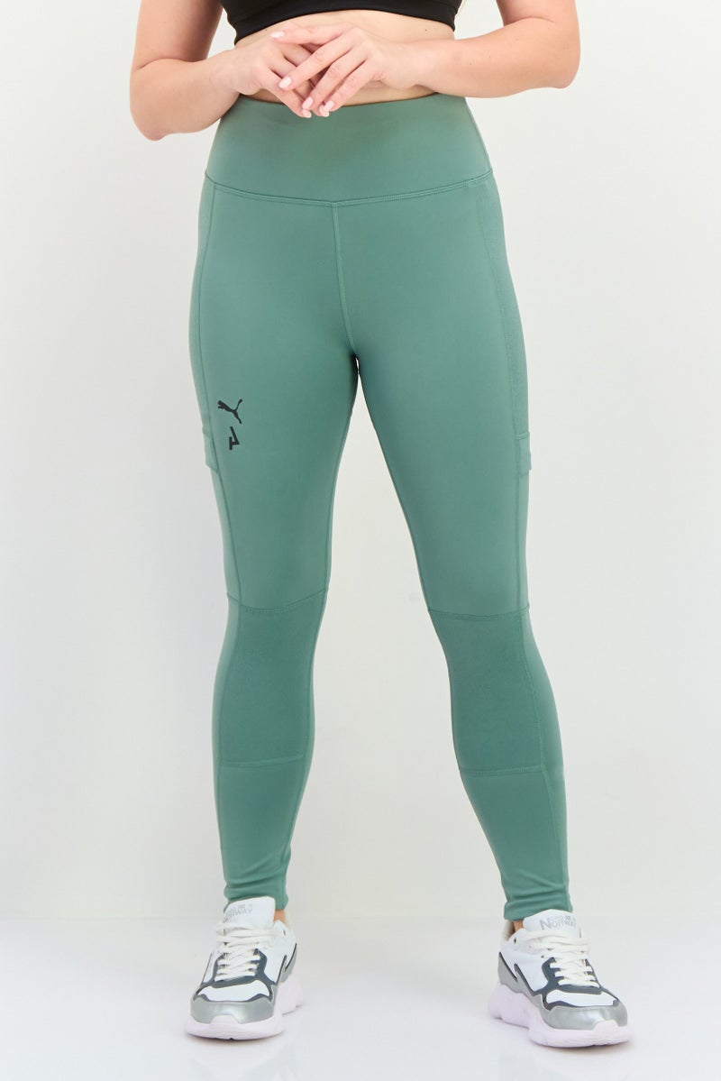 PUMA Women Tight Fit Tennis Leggings, Dark Green - Image 1