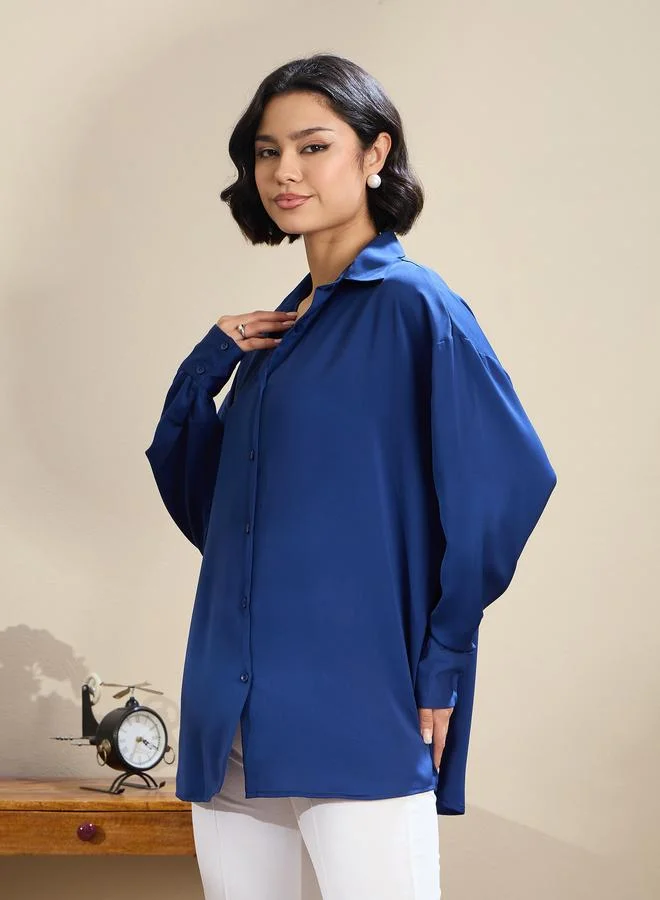 Sassafras  SASSAFRAS Royal Blue Satin Oversized Curved Hem Shirt for Women | Best Price UAE