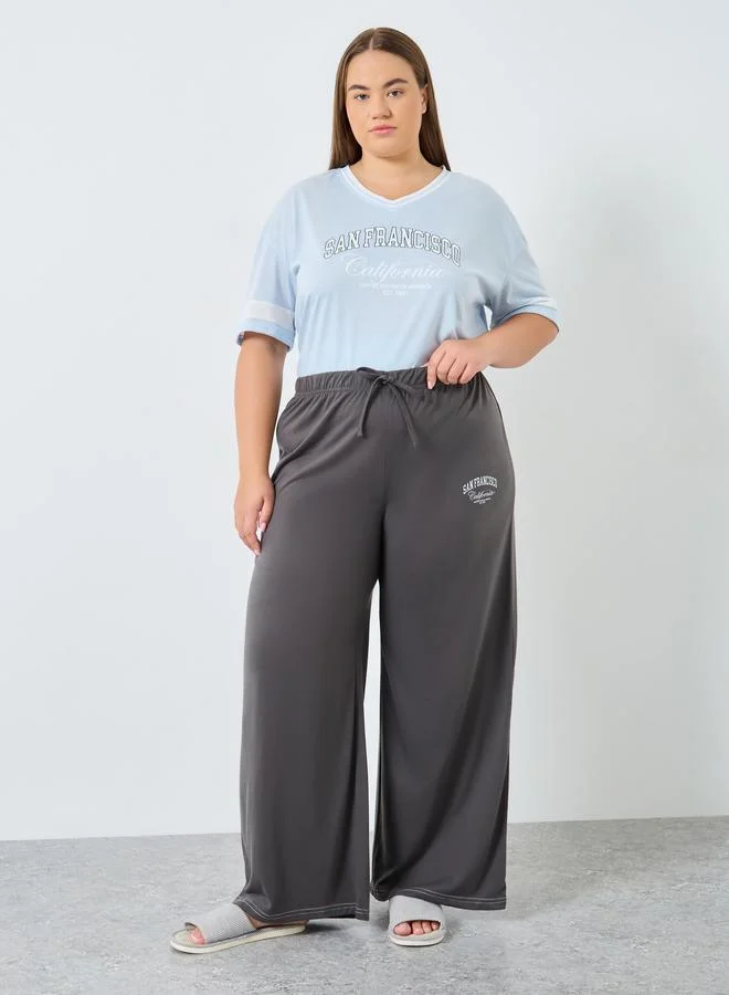 Styli Styli Plus Size Boxy Stripe Sleeve T-Shirt and Pyjama Set