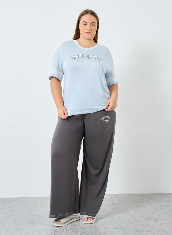 Styli Styli Plus Size Boxy Stripe Sleeve T-Shirt and Pyjama Set