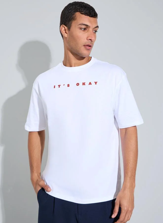 Styli  White HD Slogan Print Crew Neck Oversized T-Shirt for Men | Best Price UAE