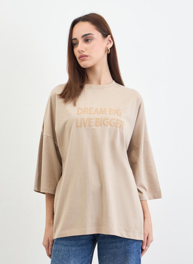 Styli Beige Slogan Embossed Oversized T-Shirt - Image 1