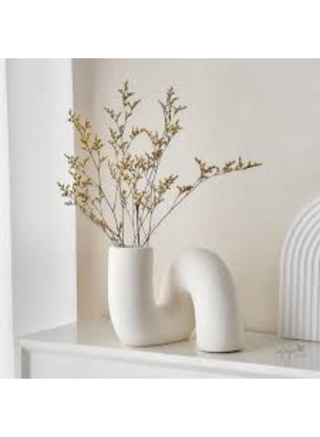 Razz Gallery The white slanted vase is a piece that combines softness and boldness in one unique design, from simple art and modern elegance to your home or office decor. - Image 2