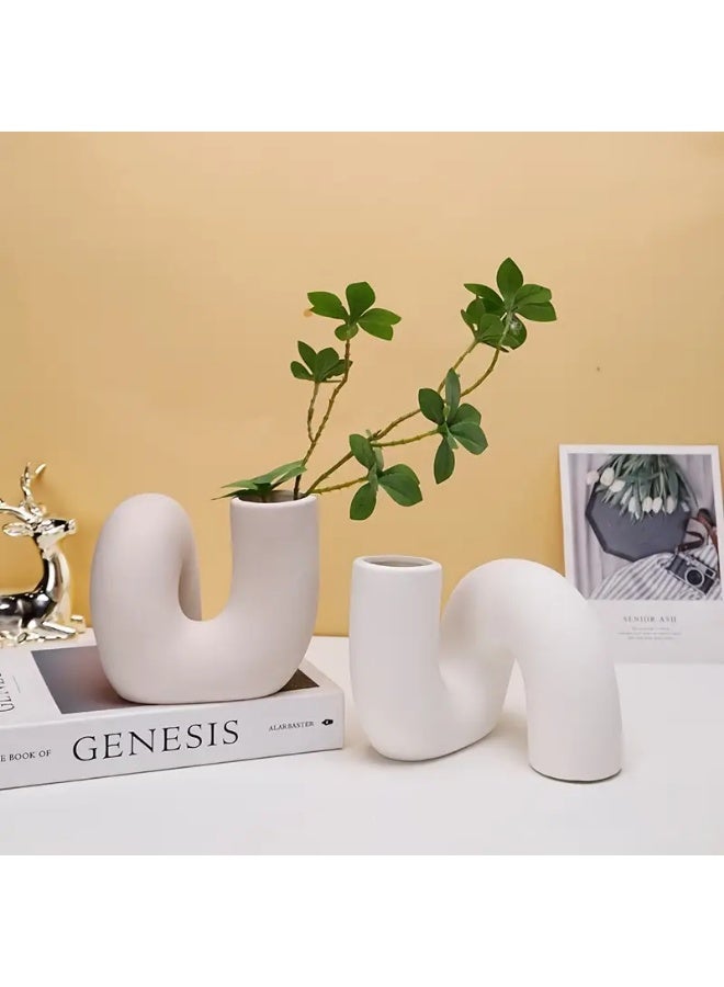 Razz Gallery The white slanted vase is a piece that combines softness and boldness in one unique design, from simple art and modern elegance to your home or office decor. - Image 1