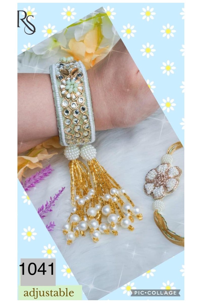 Rakhi Pair
Bhai rakhi
Bhabhi Bangle Style rakhi in Light Green Color
Beautiful kundan work in Bangle with long latkans attached.