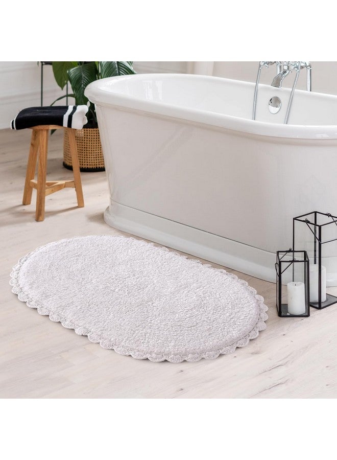 SASHAA WORLD Reversible Tufted Oval Shaped White Bathmat | Bathmat for Living Room, Bathroom, Kitchen, Bedroom, Indoor & Outdoor | 40X60 Cm - Image 1