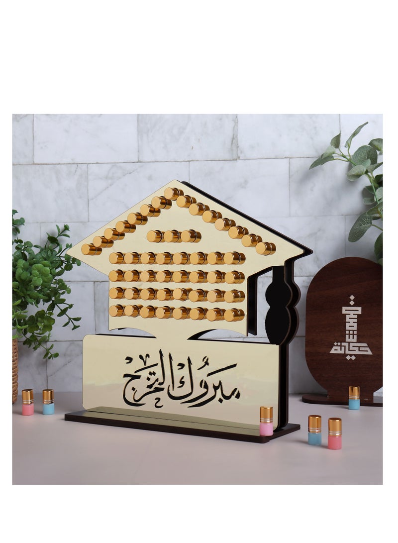حكاية شمعة استاند 50 حبة مسك فاخر (شكل تخرج) عليه عبارة مبروك التخرج - Image 1