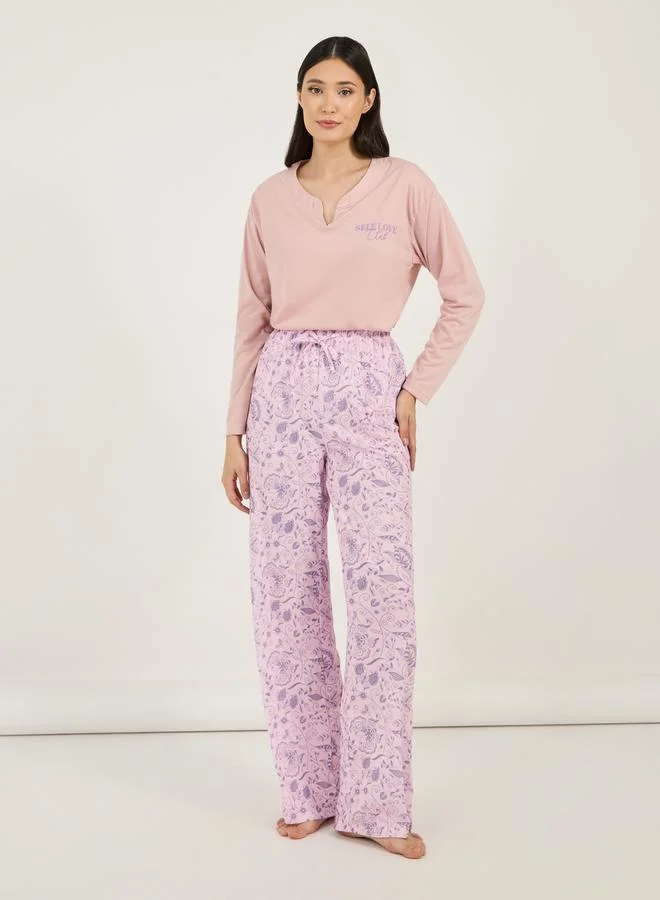 Styli Slogan Print Notch Neck Drop Shoulder T-Shirt & Floral Pyjama Set