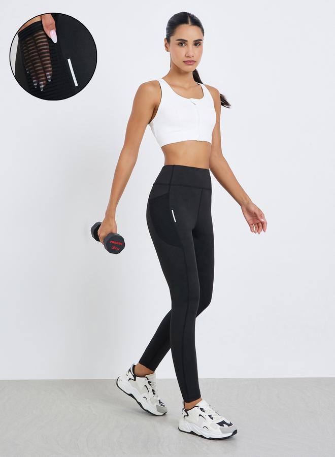 Styli Active Women Textured Pocket Reflective Stripe 7/8 Leggings - Image 1