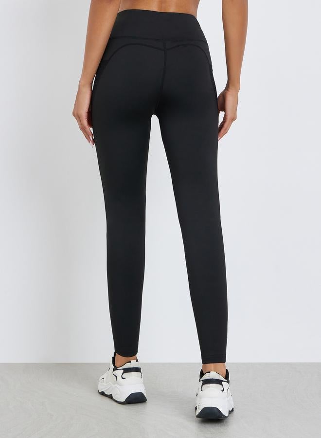 Styli Active Women Textured Pocket Reflective Stripe 7/8 Leggings - Image 4