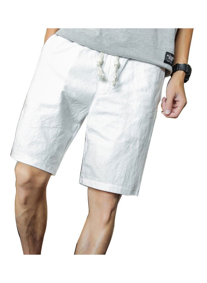 NIBEMINENT Solid Colour Linen Shorts Summer Men Beach Surfing Sports Drawstring Fifth Pants White  - Image 1