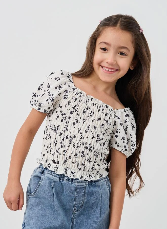 ستايلي Styli Girls Floral Print Smocked Blouse with Short Sleeves