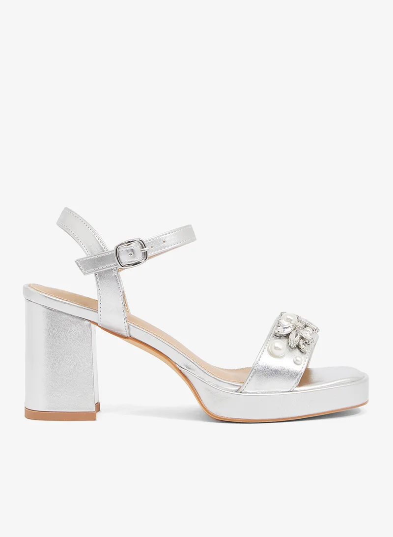 Silver platform sandal with pearls and crystal embellishments