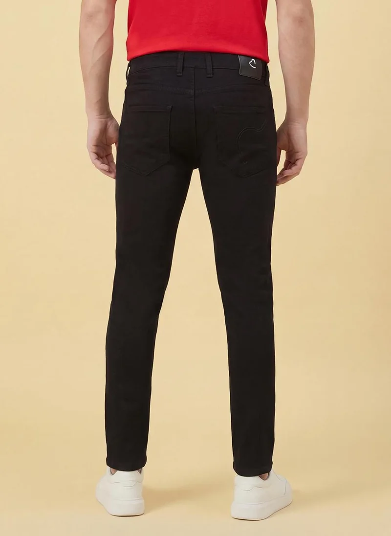 Being Human BLACK Men Cropped Tapered Fit Mid-Rise Jeans for Men | Best Price UAE