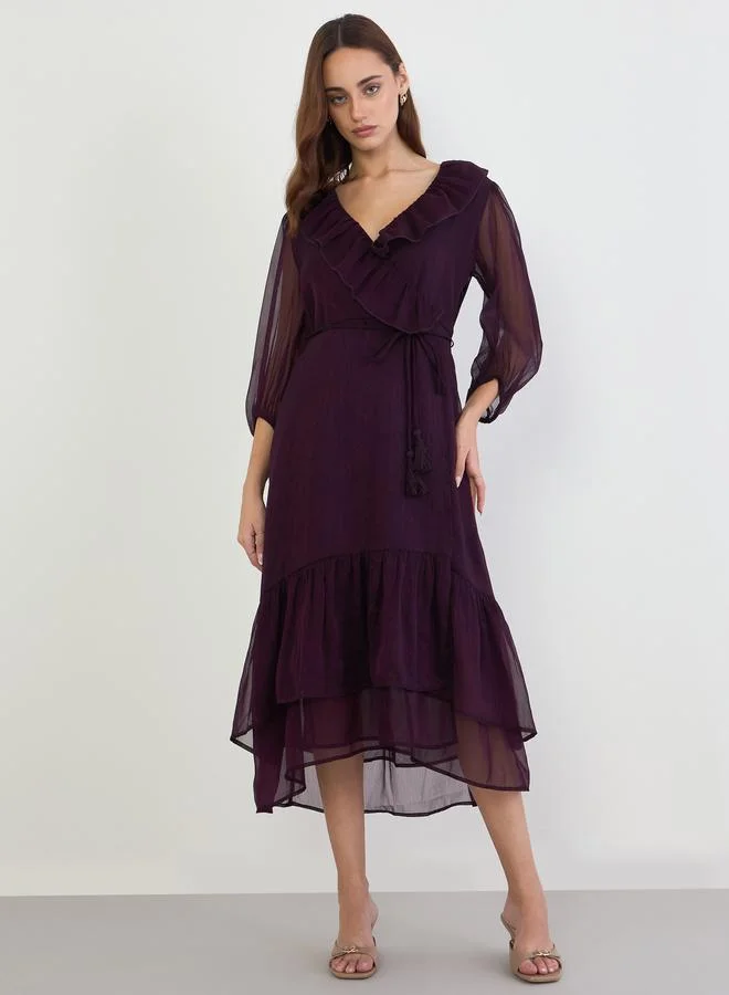 ستايلي فستان ميدي بتفاصيل كشكش