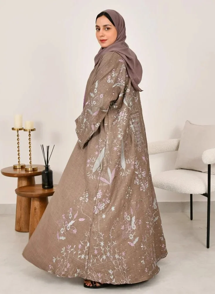 lamha abaya Brown half-cloche wrap abaya with wide sleeves and bright embroidery all over the abaya