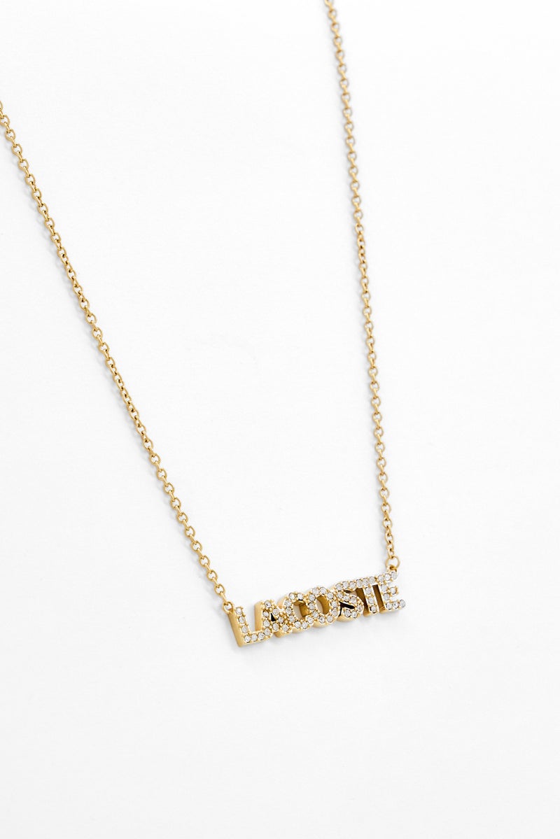 LACOSTE Women Stainless Steel Crystal Pendent Necklace, Gold - Image 1
