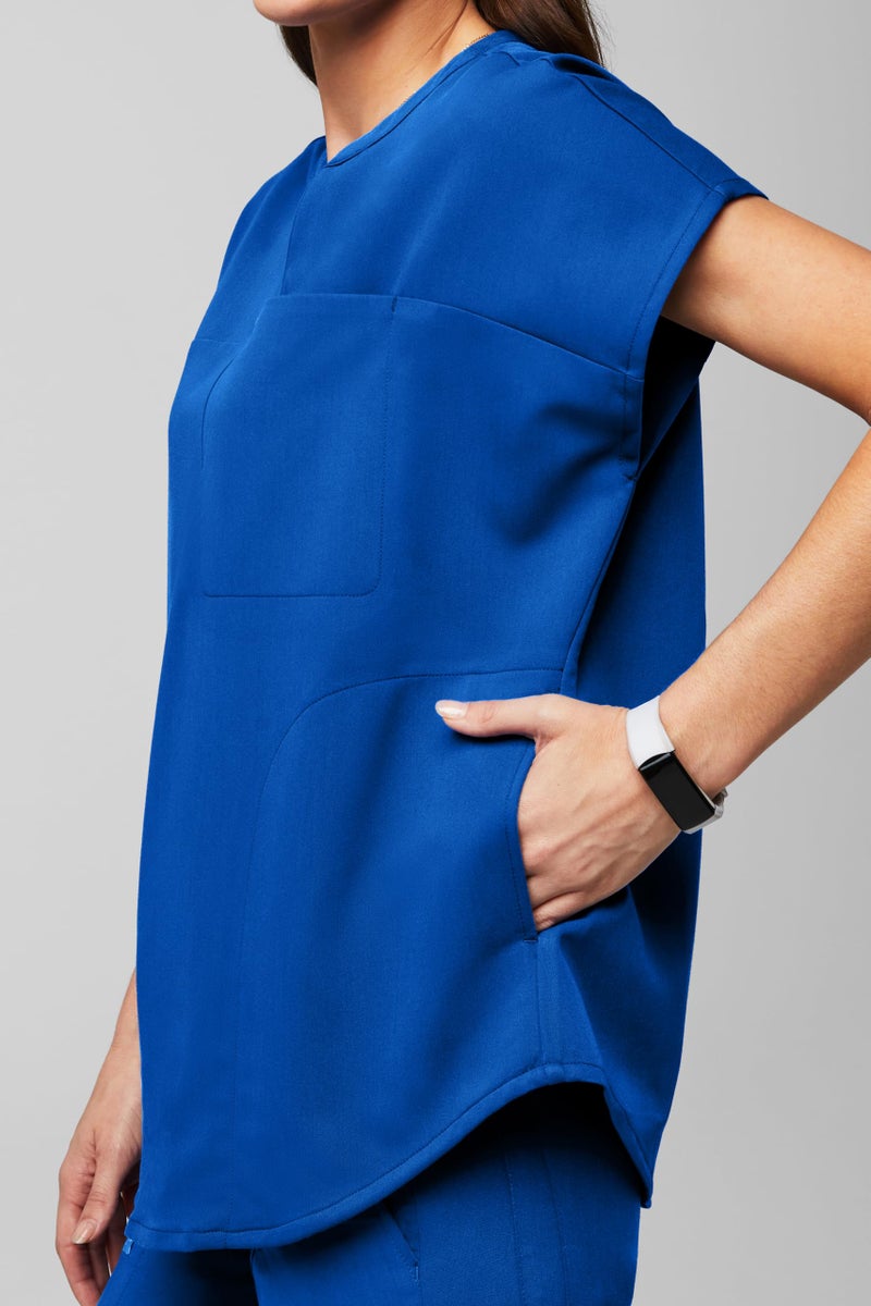 Fabletics Women's Evolve 3-Pocket Scrub Top with an Oversized Fit - MotionTech, 4-Way Stretch, Wrinkle-Resist, Anti-Shrink, L, Royal Blue - Image 4