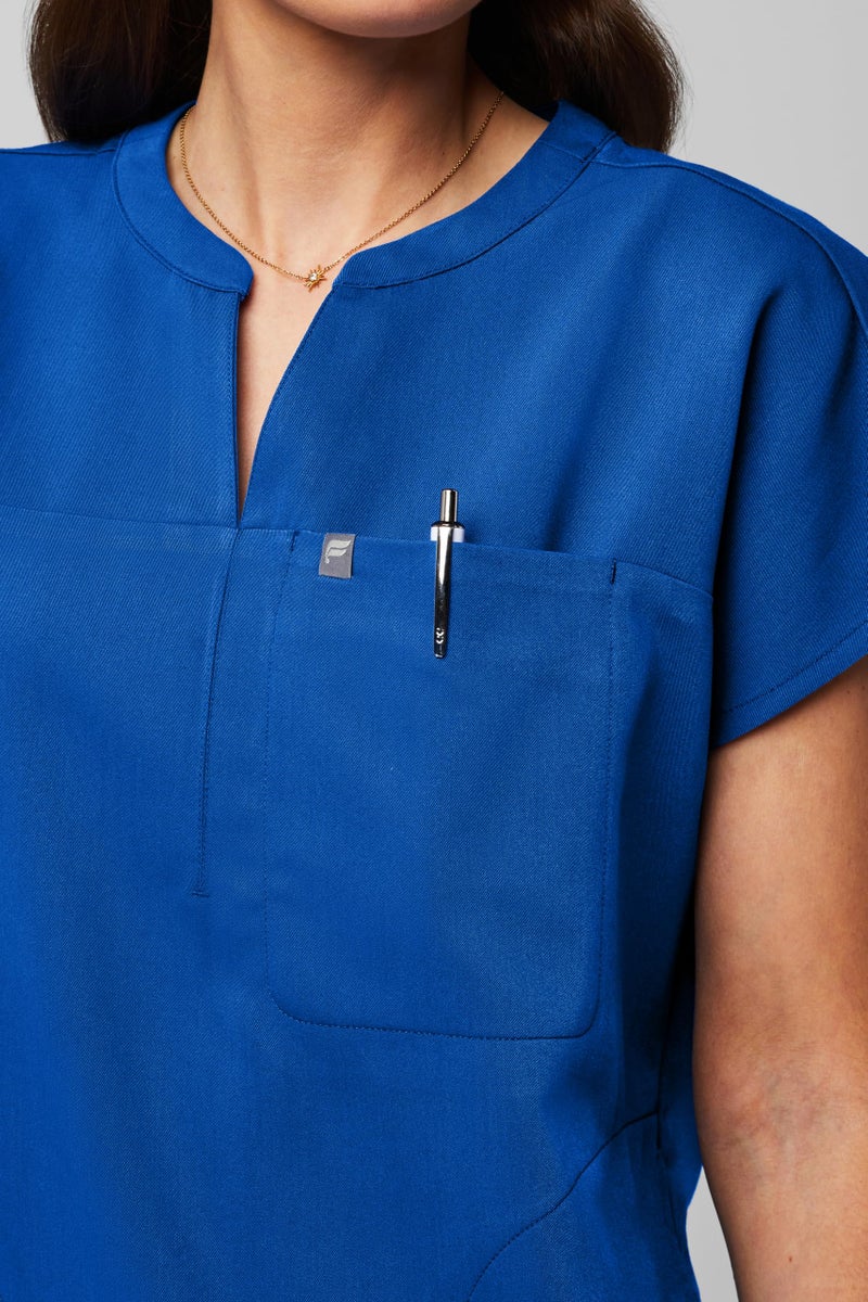 Fabletics Women's Evolve 3-Pocket Scrub Top with an Oversized Fit - MotionTech, 4-Way Stretch, Wrinkle-Resist, Anti-Shrink, L, Royal Blue - Image 3
