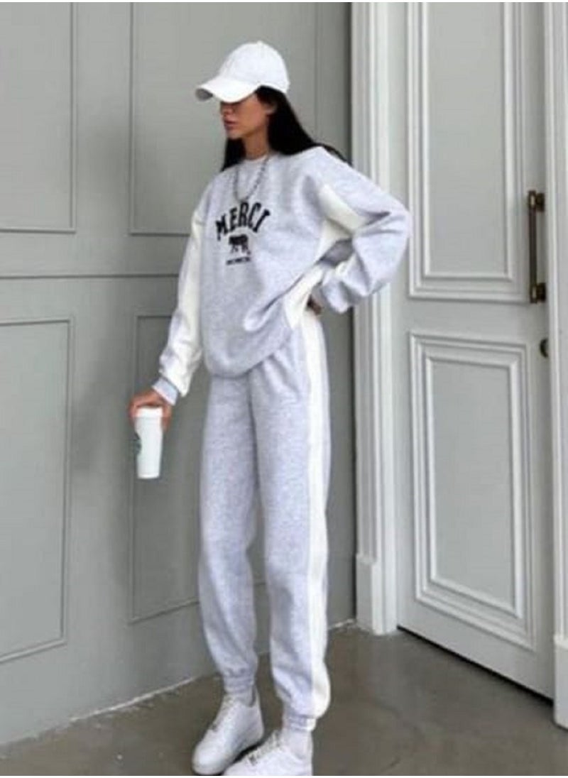 MANIKAN MANIKAN- Gray sports set with white accents, featuring a modern and stylish design perfect  - Image 2