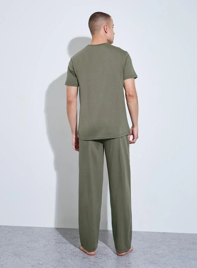 Styli Olive Men Olive Graphic Print Relaxed Fit Pyjama Set for Men | Best Price UAE