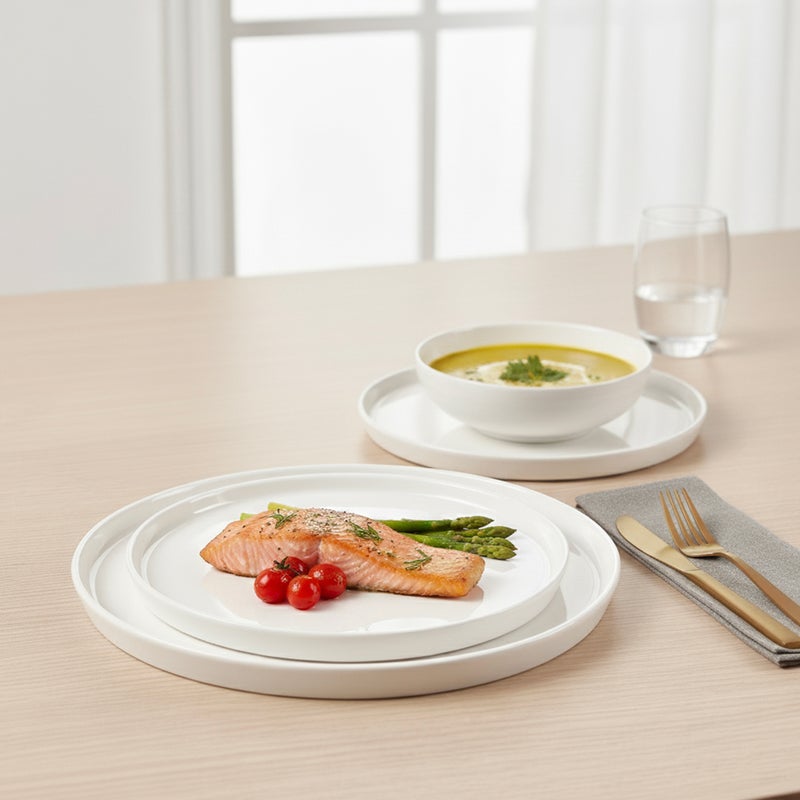 Cuisine Art طقم عشاء 12 قطعة من كوزين آرت من البورسلين العظمي الأبيض الفاخر | 4 أطباق عشاء، 4 أطباق جانبية، 4 سلطانيات | أدوات مائدة أنيقة، خفيفة الوزن، ومتينة للمنزل، الفنادق، وتناول الطعام اليومي - Image 5