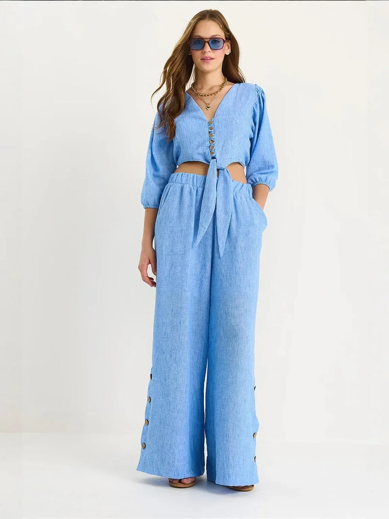 بيانكو لوتشي طقم قطعتين بأكمام طويلة وياقة على شكل حرف  من لوكسي