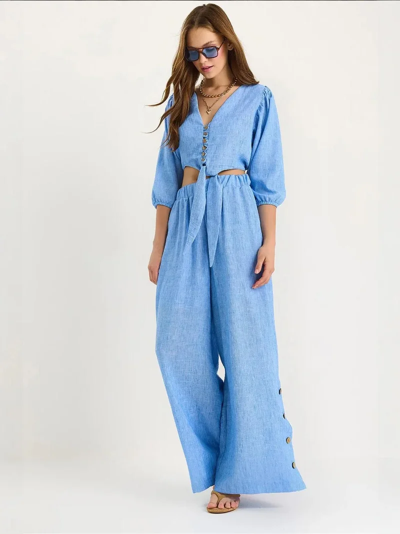 بيانكو لوتشي طقم قطعتين بأكمام طويلة وياقة على شكل حرف  من لوكسي