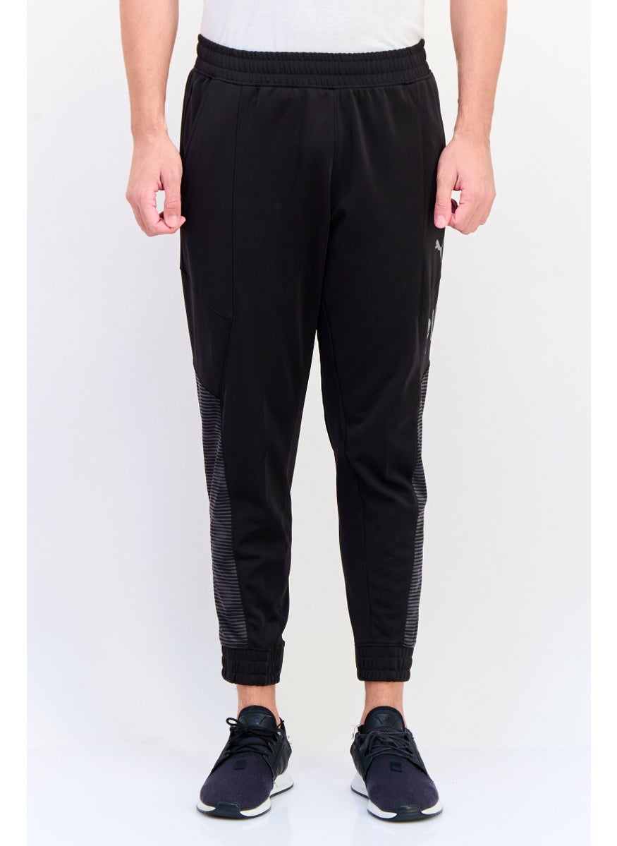 PUMA Men  Sportswear Fit Brand Logo Hyperwave Jogger Pants, Multicolor  - Image 1