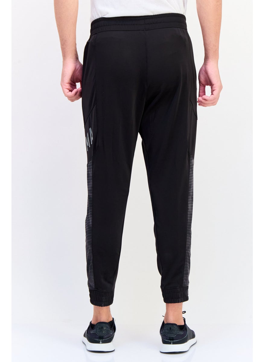 PUMA Men  Sportswear Fit Brand Logo Hyperwave Jogger Pants, Multicolor  - Image 4