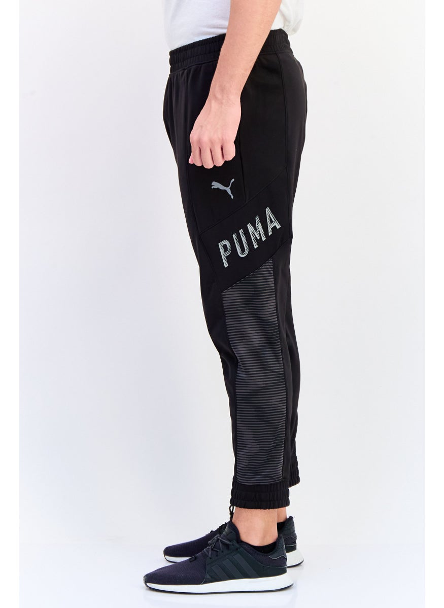 PUMA Men  Sportswear Fit Brand Logo Hyperwave Jogger Pants, Multicolor  - Image 2