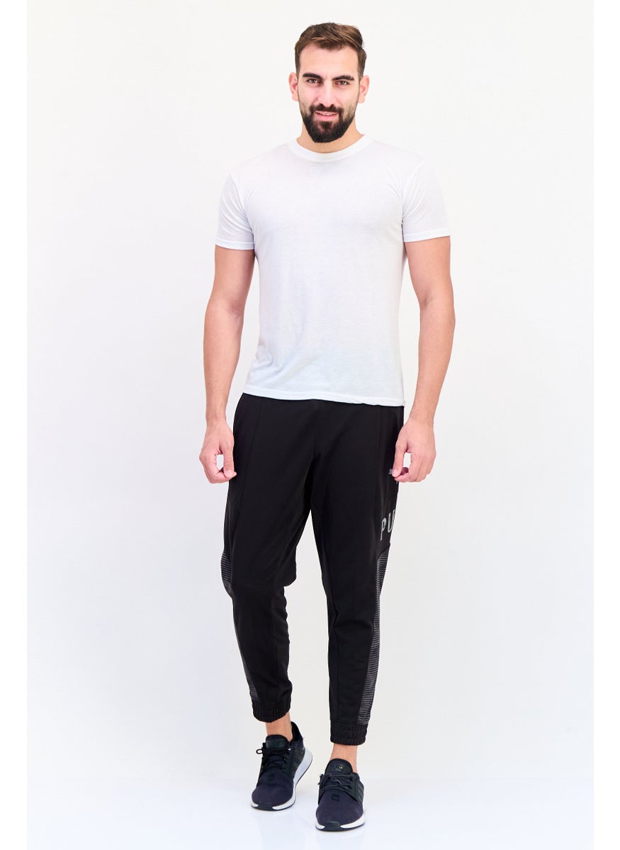 PUMA Men  Sportswear Fit Brand Logo Hyperwave Jogger Pants, Multicolor  - Image 3