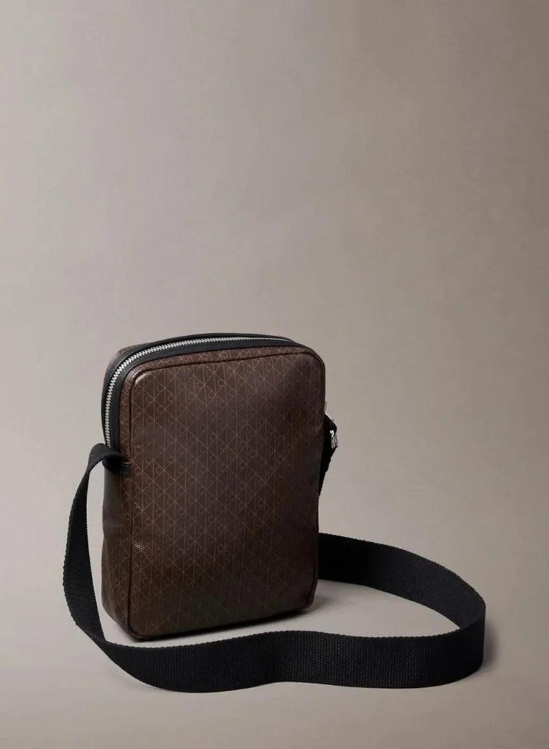 Calvin Klein Mulch AOP Allover Emblem Logo Reporter Bag for Men | Best Price UAE