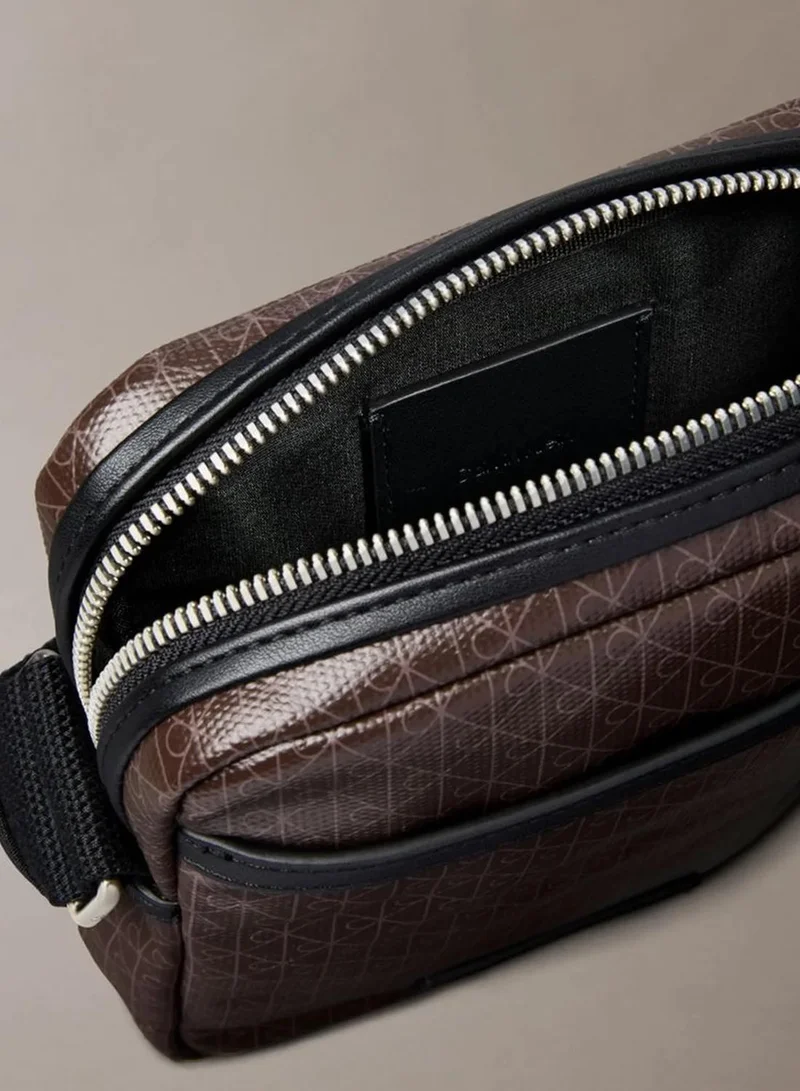 Calvin Klein Mulch AOP Allover Emblem Logo Reporter Bag for Men | Best Price UAE