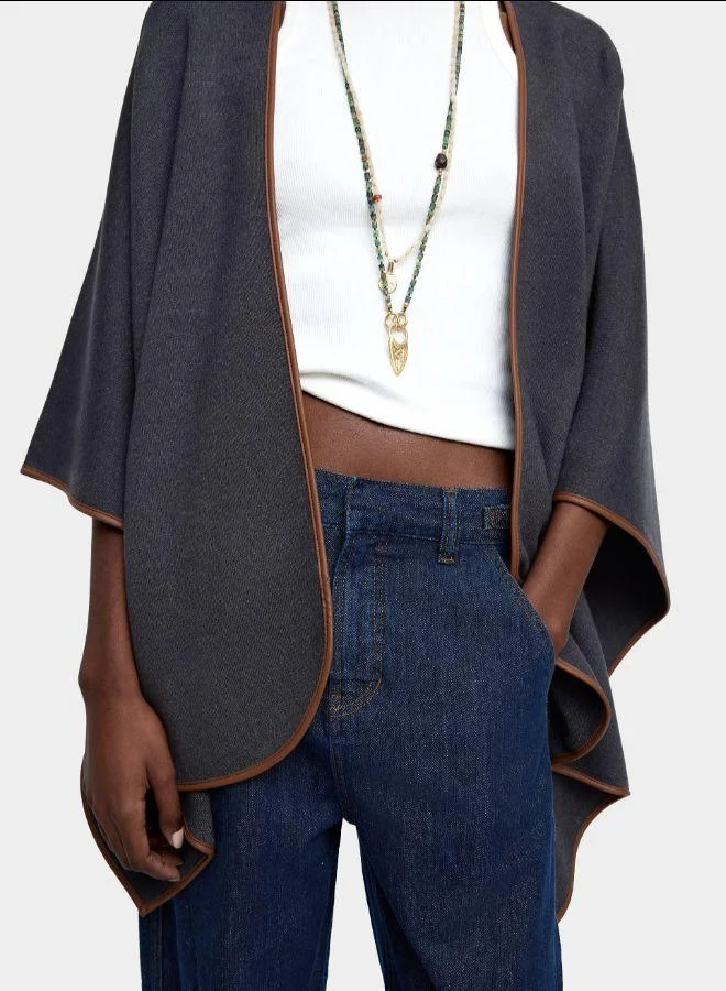 بارفوا بونشو محبوك مع تفاصيل خياطة