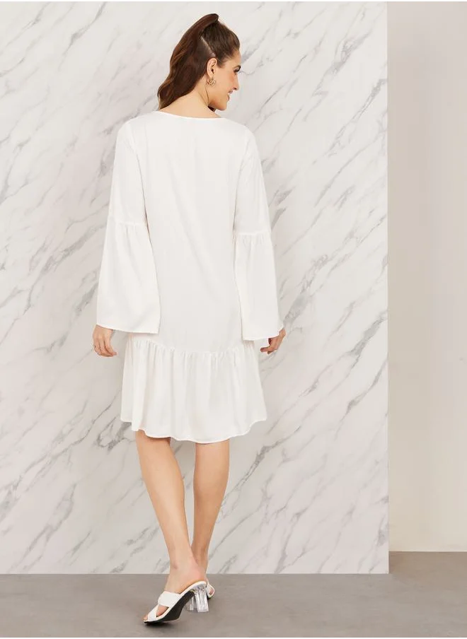 Styli Lace Detail Tie Up Neck Knee Length Dress