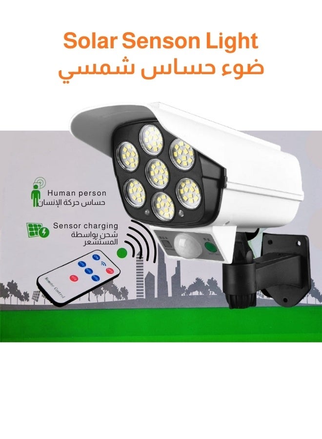 Outdoor solar-powered spotlight with a camera design, motion sensor, and remote control, featuring 77 LEDs, water and dust resistant. - Image 1