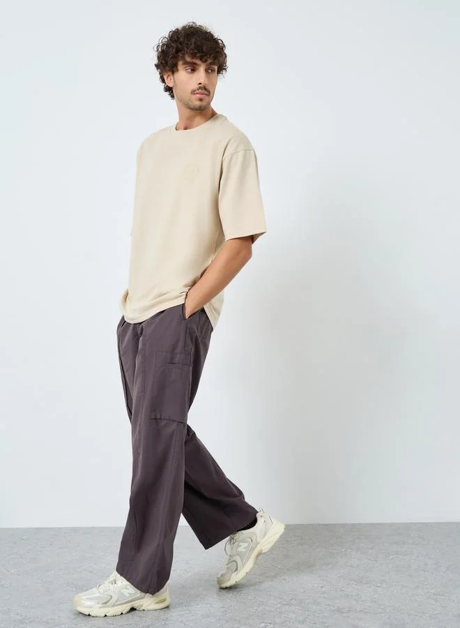 Styli Beige Graphic Print Oversized T-Shirt