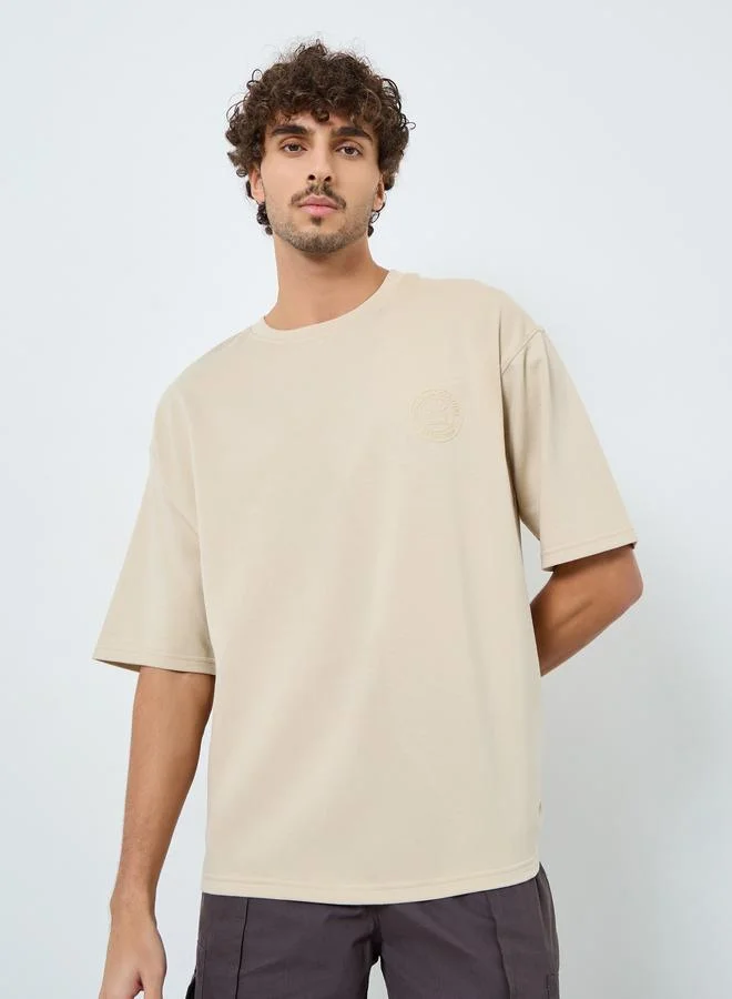 Styli Beige Graphic Print Oversized T-Shirt