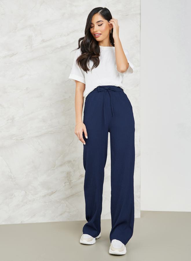 Styli Textured Wide Leg Pants with Side Pocket - Image 1