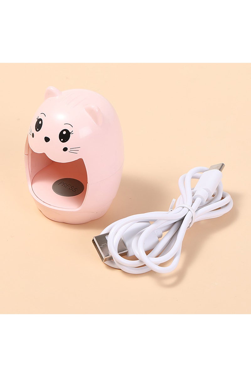 جهاز صغير للعلاج الضوئي باللون الوردي، على شكل رسوم متحركة، لتقوية أظافر إصبع واحد، مزود بإضاءة LED سريعة الجفاف