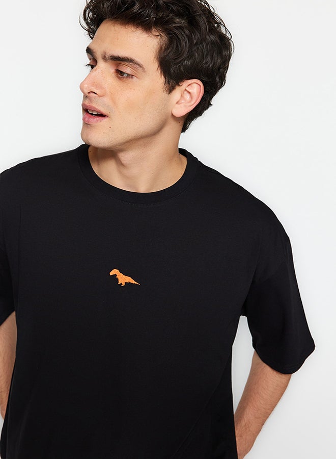trendyol Black Oversize Fit Crew Neck Short Sleeve Dinosaur Embroidered 100% Cotton T-Shirt TMNSS23TS00243 - Image 1