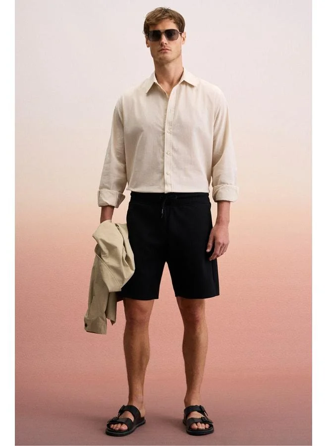GRIMELANGE TYRONE Men's Elastic Waist Single Back Pocket Relaxed Fit Black Shorts.