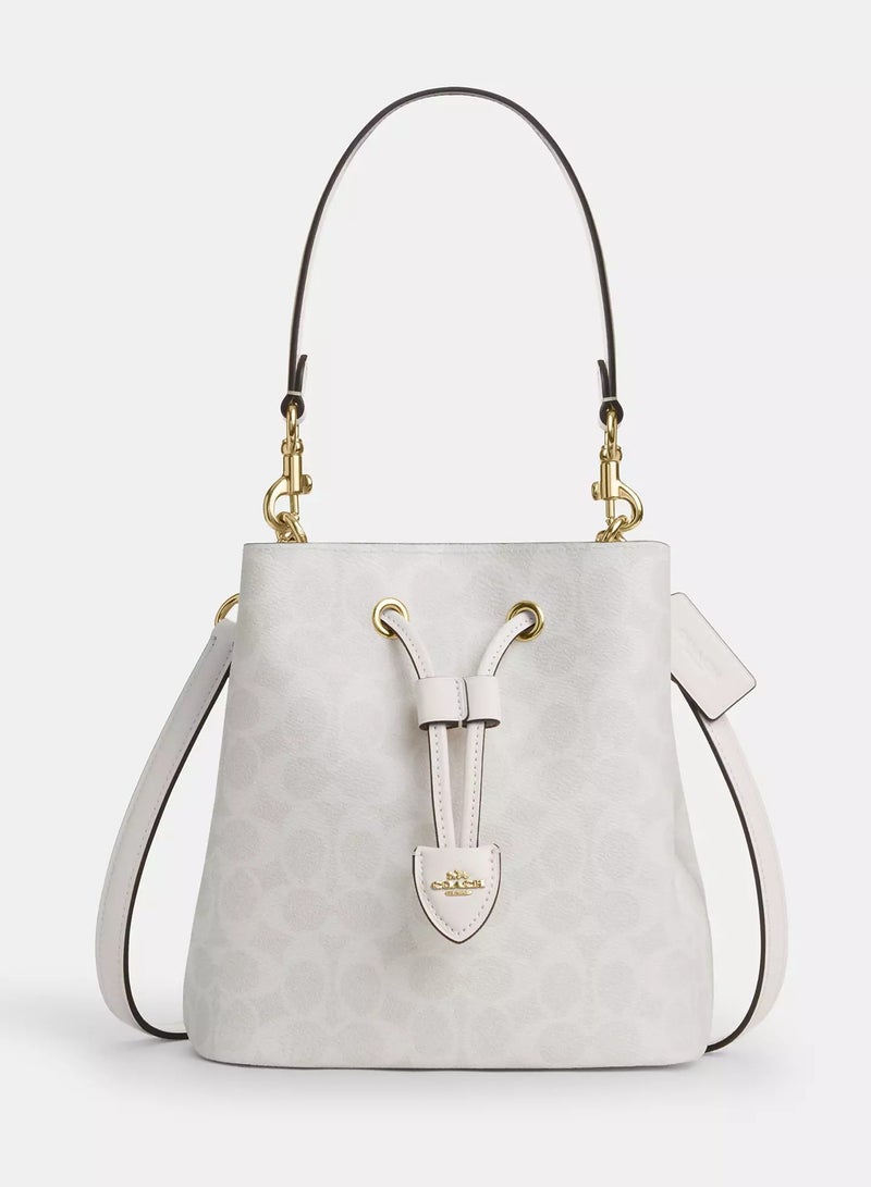 كوتش اوت ليت حقيبة كوتش روان دلو من القماش المميز مع حزام قابل للفصل، حقيبة كتف نسائية، حقيبة كروس نسائية، حقيبة توت نسائية، حقيبة يد نسائية، حقيبة سفر نسائية، أبيض - 22 سم - Image 1