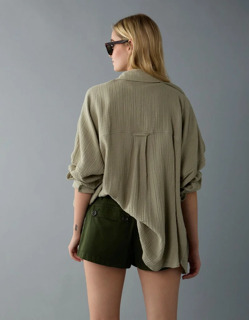 امريكان ايجل قميص فضفاض مزيّن بعبارة