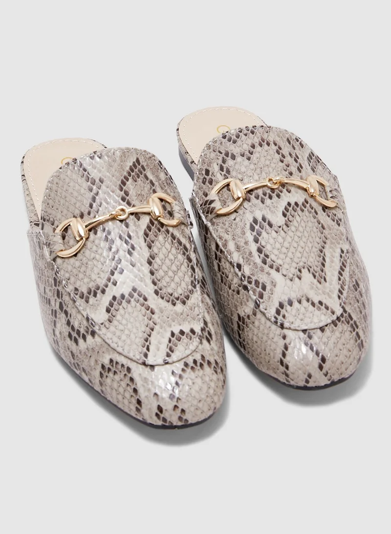 Ginger Flat Slip On Mule In Woven Fabric With Snaffle